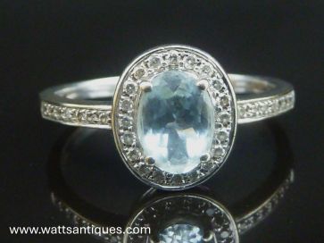 AQUAMARINE & DIAMOND HALO RING
