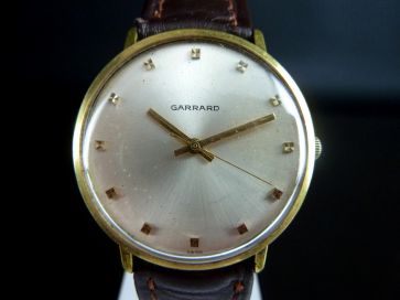 GARRARD GOLD TONE WATCH