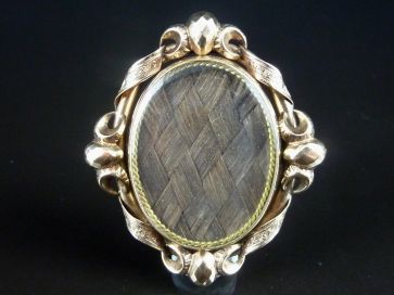 GOLD REVOLVING HAIR BROOCH