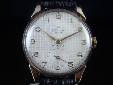 SMITHS DELUXE 9CT WATCH 
